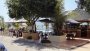 The pool, bar/resturant and parking area at the Treasure Island Beach Resort
