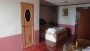 The main room. The bathroom door is visible.